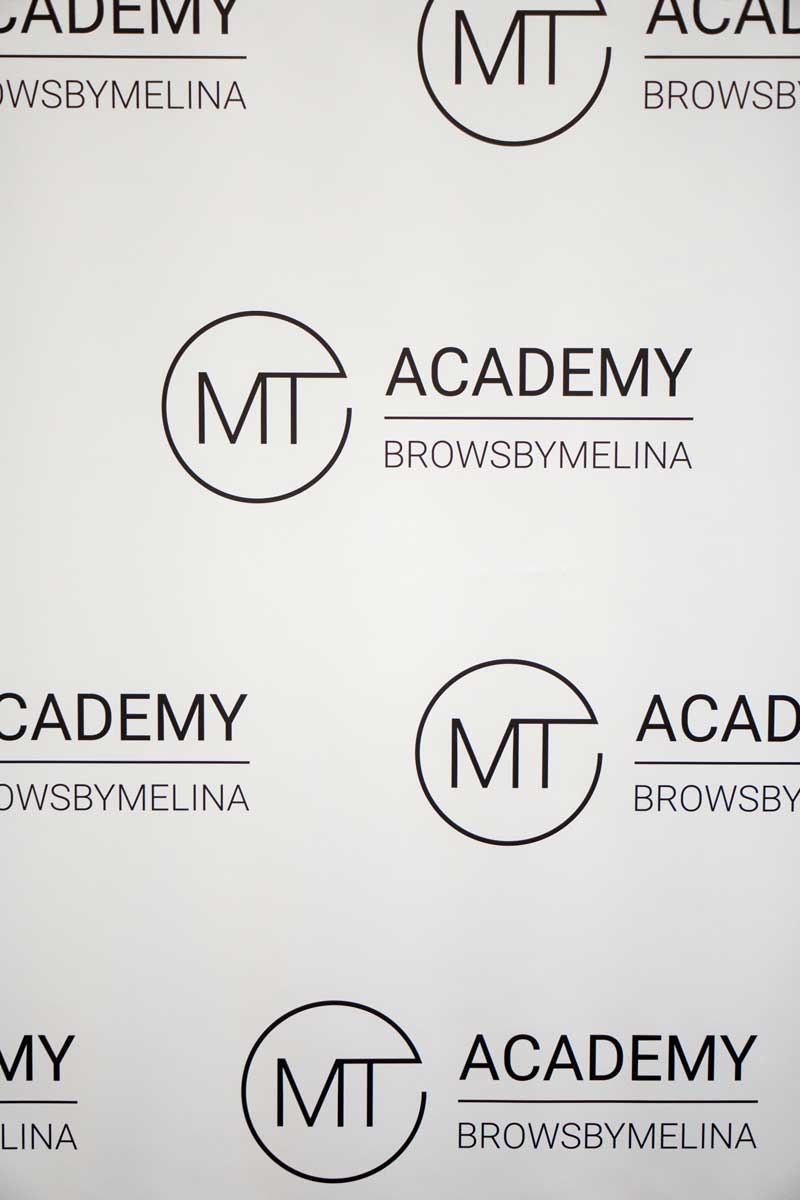 Backdrop with MT Academy logo